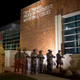National Guard troops stand outside the police department in Ferguson, Mo., after violent protests engulfed the area Nov. 25, 2014, when a grand jury decided not to indict Officer Darren Wilson in the killing of teenager Michael Brown.
Aaron P. Bernstein/Getty Images